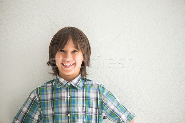 Boy with long hair Stock photo © zurijeta