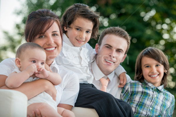 Happy family in a row Stock photo © zurijeta