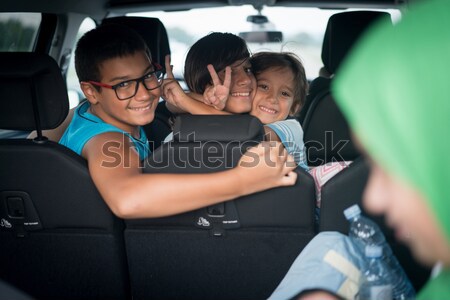 Cheerful kids on a backseat Stock photo © zurijeta