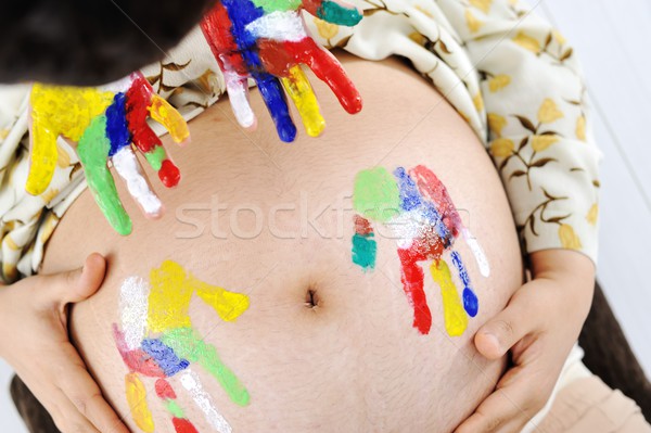 Foto d'archivio: Donna · incinta · colorato · divertente · mani · disegno