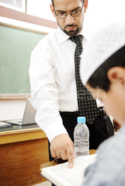 Giovani insegnante aiutare studente classe uomo Foto d'archivio © zurijeta
