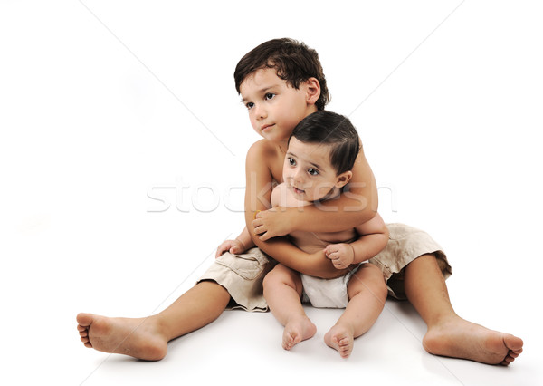 Little kid taking care of his little brother Stock photo © zurijeta