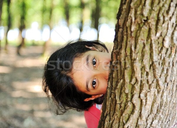 Girl in forest hiding Stock photo © zurijeta