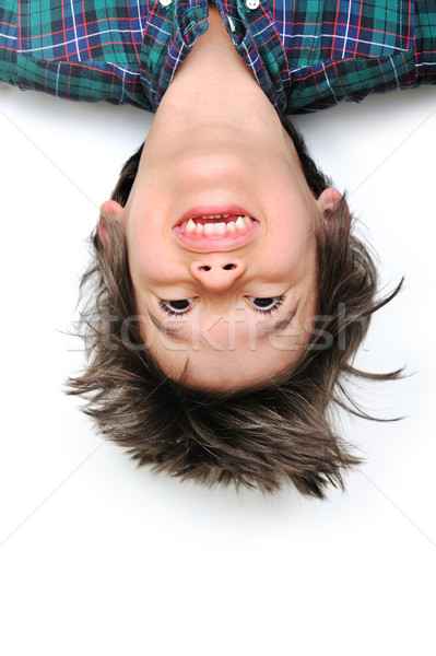 Kicsi fiú szórakozás fejjel lefelé játék támogatás Stock fotó © zurijeta