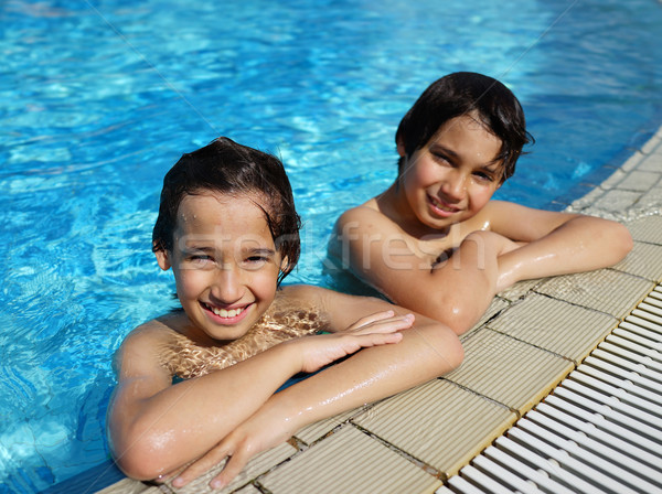 Fericit copii vară piscină Imagine de stoc © zurijeta