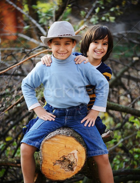 Boy portrait on tree outdoor in nature Stock photo © zurijeta