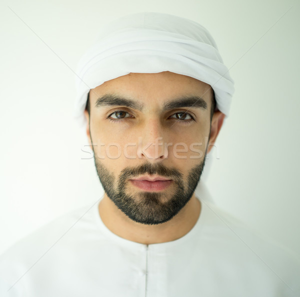 Atraente árabe homem moço posando Foto stock © zurijeta