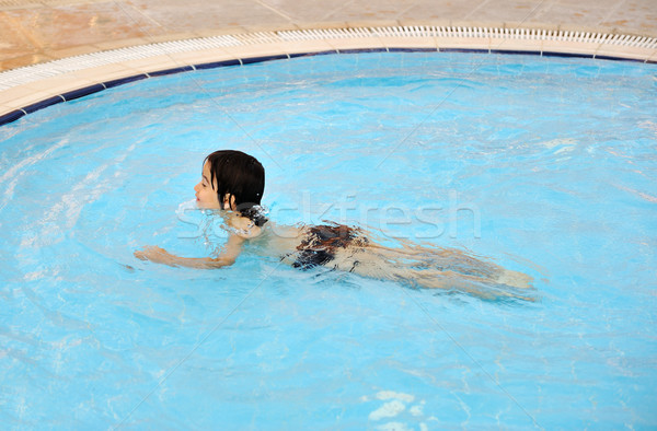  boy  in swimming pool Stock photo © zurijeta