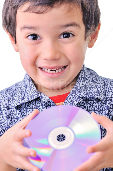 Little boy holding cd dvd Stock photo © zurijeta