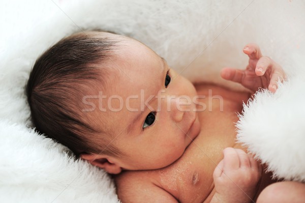 Recién nacido bebé sonrisa nino naranja cama Foto stock © zurijeta