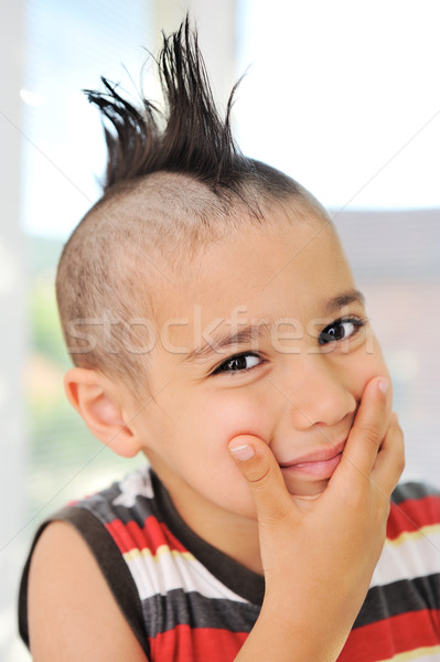 Cute piccolo ragazzo divertente capelli smorfia Foto d'archivio © zurijeta
