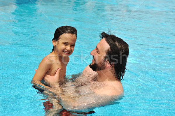 Stockfoto: Gelukkig · vader · zoon · zwembad · water · kinderen · man