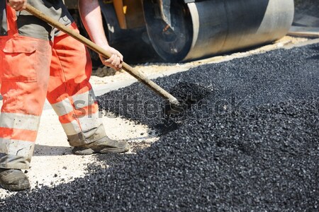Duro lavoro asfalto costruzione uomini lavoro lavoro Foto d'archivio © zurijeta
