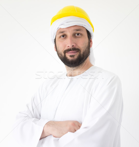 Arabic male engineer with yellow builder helmet Stock photo © zurijeta