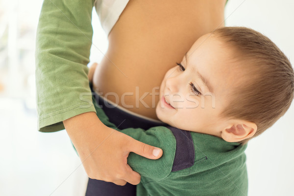 Happy little kid loving his bigger brother Stock photo © zurijeta