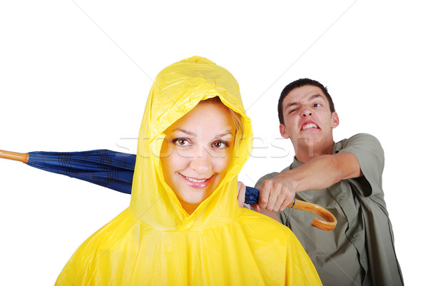 Male model about to hit female in yellow hood Stock photo © zurijeta