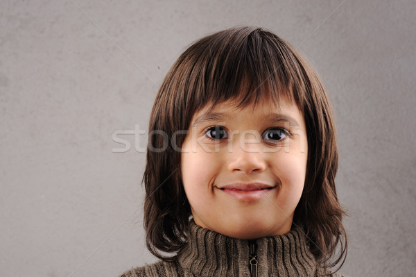 Elev inteligent copil ani vechi expresii faciale Imagine de stoc © zurijeta