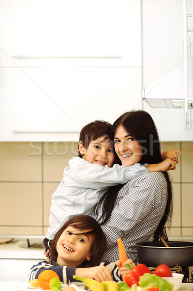 Mother And Children Prepare A meal,mealtime Together Stock photo © zurijeta