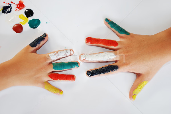 Children little hands playing with colors on white background Stock photo © zurijeta