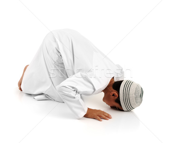 Stock photo: Islamic pray explanation full serie. Arabic child showing complete Muslim movements while praying, s