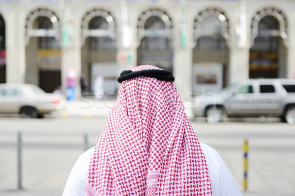 Modern Arabic businessman on street walking Stock photo © zurijeta