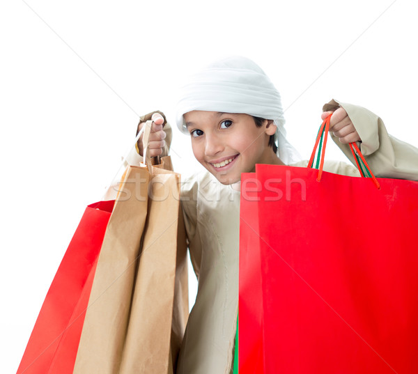 Arabic kid with shopping bags Stock photo © zurijeta