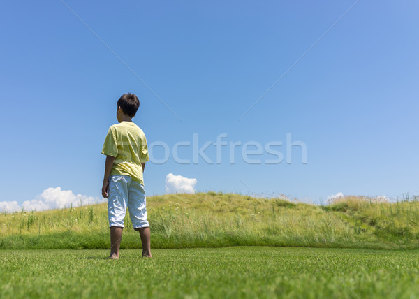 Boy with open hands in beautiful nature Stock photo © zurijeta