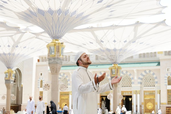Stock photo: Muslim praying at Medina mosque