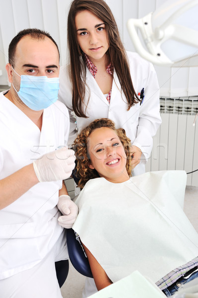 Healthy teeth patient at dentist office dental caries prevention Stock photo © zurijeta