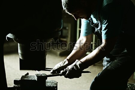 Iron casting process with high temperature fire in old metal par Stock photo © zurijeta