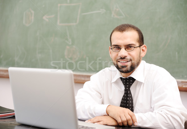 Education activities in classroom at school, Happy teacher with laptop Stock photo © zurijeta