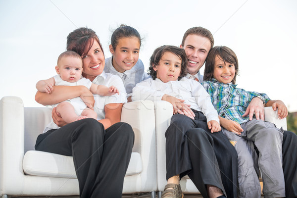 Happy family sitting Stock photo © zurijeta