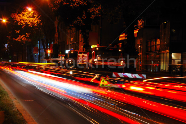Colorful scene of traffic at night and workin area beside Stock photo © zurijeta