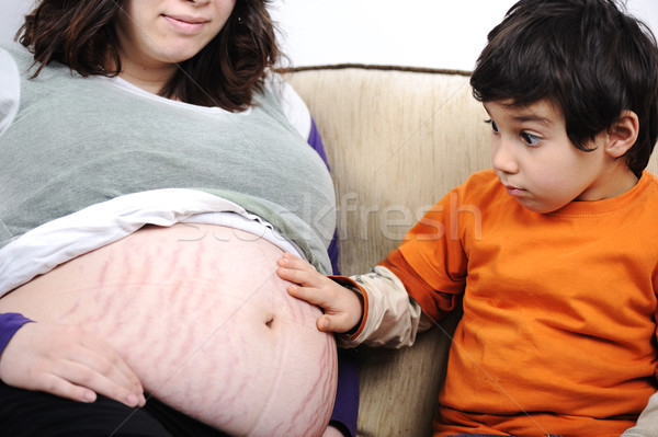 A little boy and his pregnant mother spend time together Stock photo © zurijeta