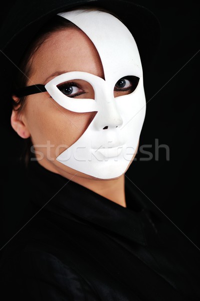 Young woman with black and white mask Stock photo © zurijeta