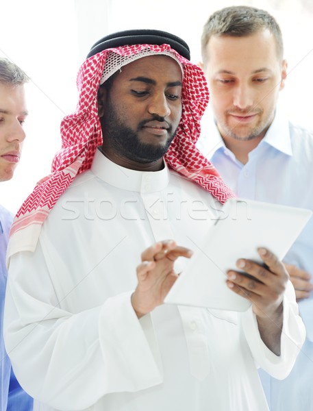 Stock photo: Business international group planning on tablet