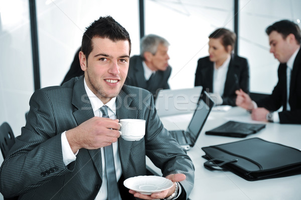 Businessman in business ambience drinking cofee Stock photo © zurijeta