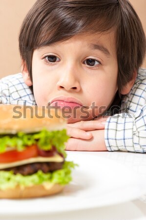 Kid and burger Stock photo © zurijeta