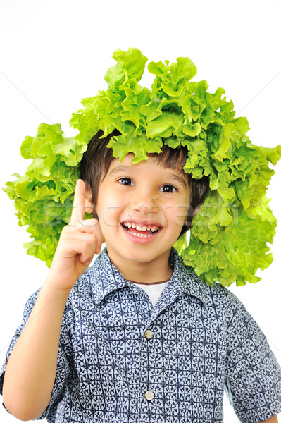 Kid with salad on his head as hat having an idea Stock photo © zurijeta