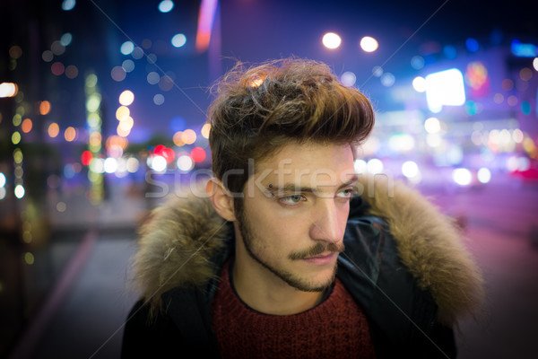 Young people on the night city street freezing of cold Stock photo © zurijeta