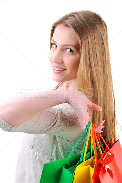 Closeup image of a teen girl holding shopping bags Stock photo © zurijeta