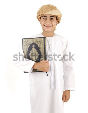 Arabic boy with Koran isolated Stock photo © zurijeta