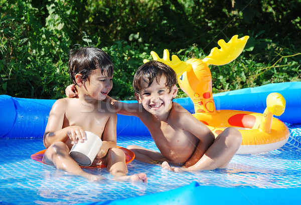 Copii activitati piscină vară faţă distracţie Imagine de stoc © zurijeta