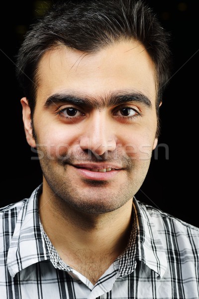 Közel-keleti fiatalember portré autentikus arc férfi Stock fotó © zurijeta