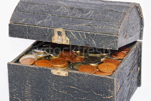 Many coins in one old chest isolated Stock photo © zurijeta