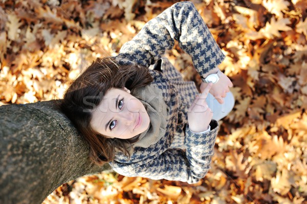 Stock photo: Young girl in beautiful autumn park