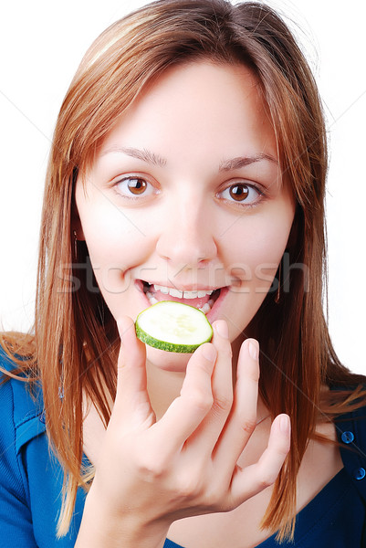 Nice girl about to eat a cucumber Stock photo © zurijeta