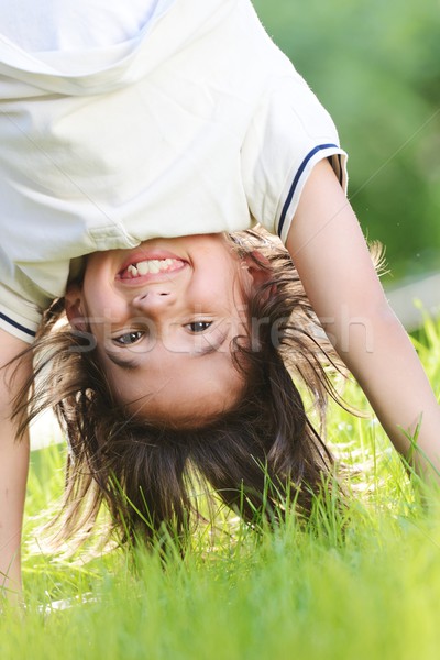 Group of happy children playing outdoors in spring park Stock photo © zurijeta