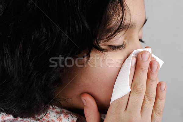 Little girl blows her nose Stock photo © zurijeta