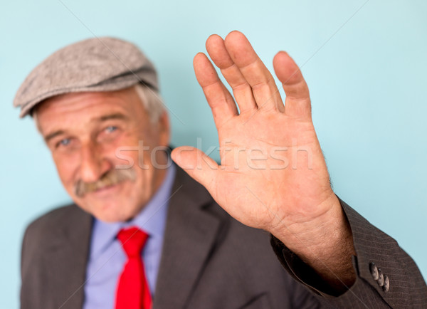 Stock photo: Smiling and confident mature businessman with mustache and gray 